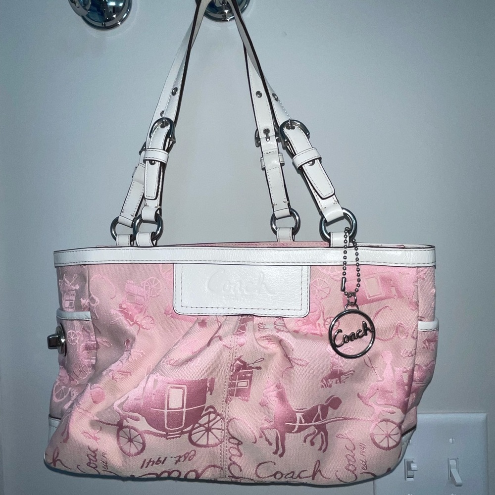 Bright pink carriage shoulder bag by Coach